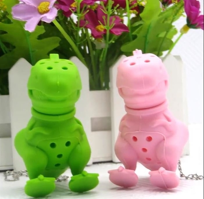 Il dinosauro ha modellato la bustina di tè libera del silicone di progettazione BPA FDA con il pacchetto della scatola