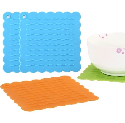 Gli strumenti della cucina del silicone di Placemat del buongustaio hanno impresso il modello di Wave dell'acqua