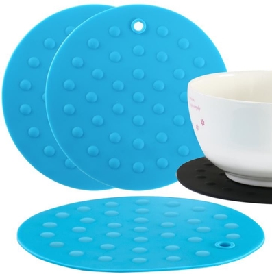 Gli utensili da cucina di gomma rotondi, stuoia di cottura del silicone impressa punteggia lo stile