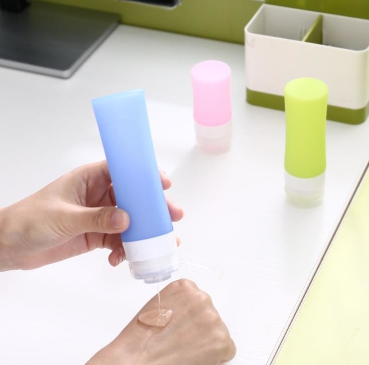Bottiglia dell'imballaggio di viaggio del silicone da 1 oncia, contenitori di viaggio del silicone che mescolano colore